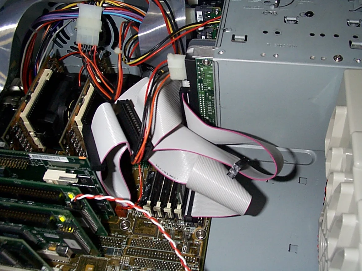 Two Celeron processors and ribbon cables inside the computer